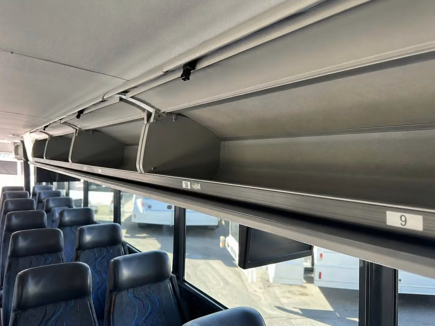 northglenn 25 passenger minibus overhead storage
