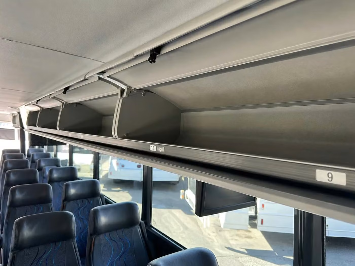 northglenn 28 passenger minibus overhead storage
