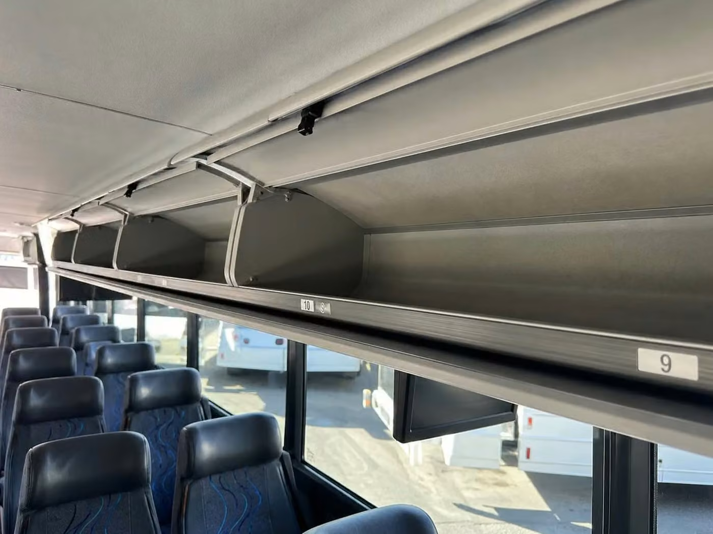 northglenn 35 passenger minibus overhead storage