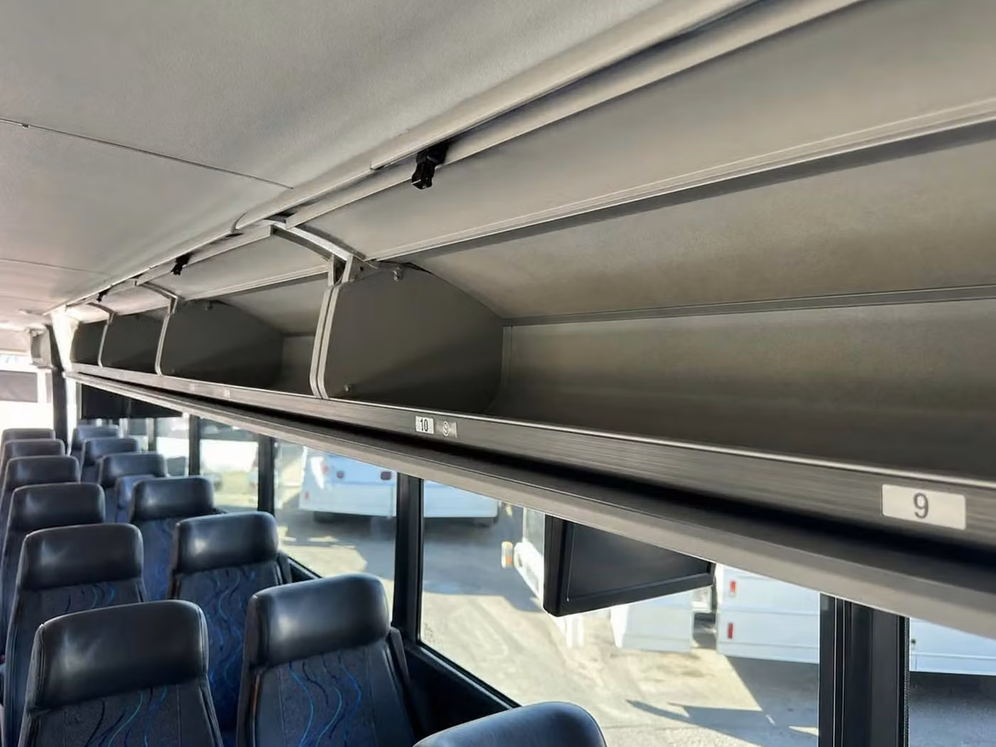northglenn 56 passenger charter bus overhead storage
